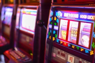Jurassic Kingdom slot game interface showing dinosaur-themed reels and control panel